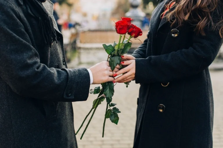 man-giving-flowers